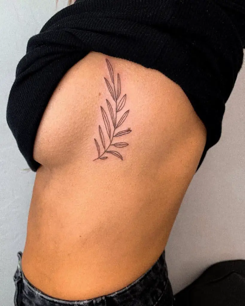 The rib-cage olive branch tattoo