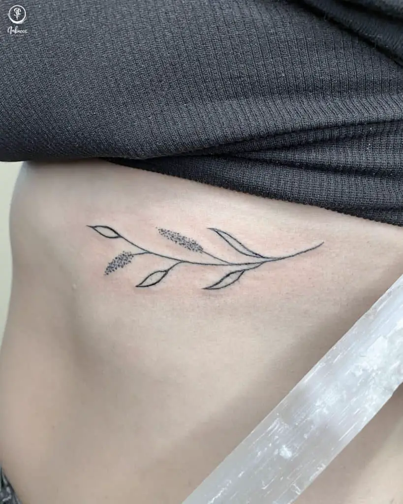 Upper ribcage tattoo that age well 1