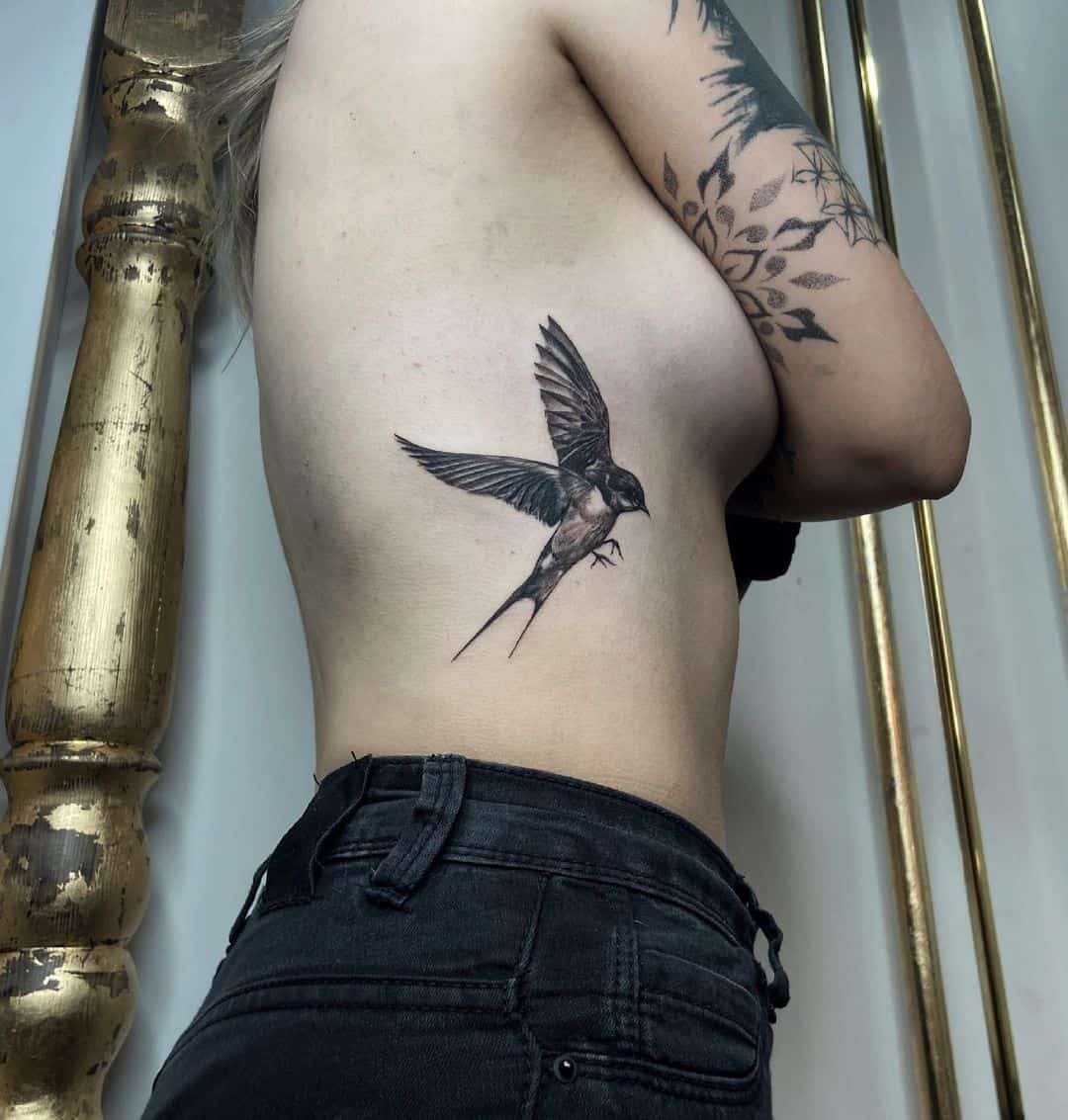 Bird side tattoo 5