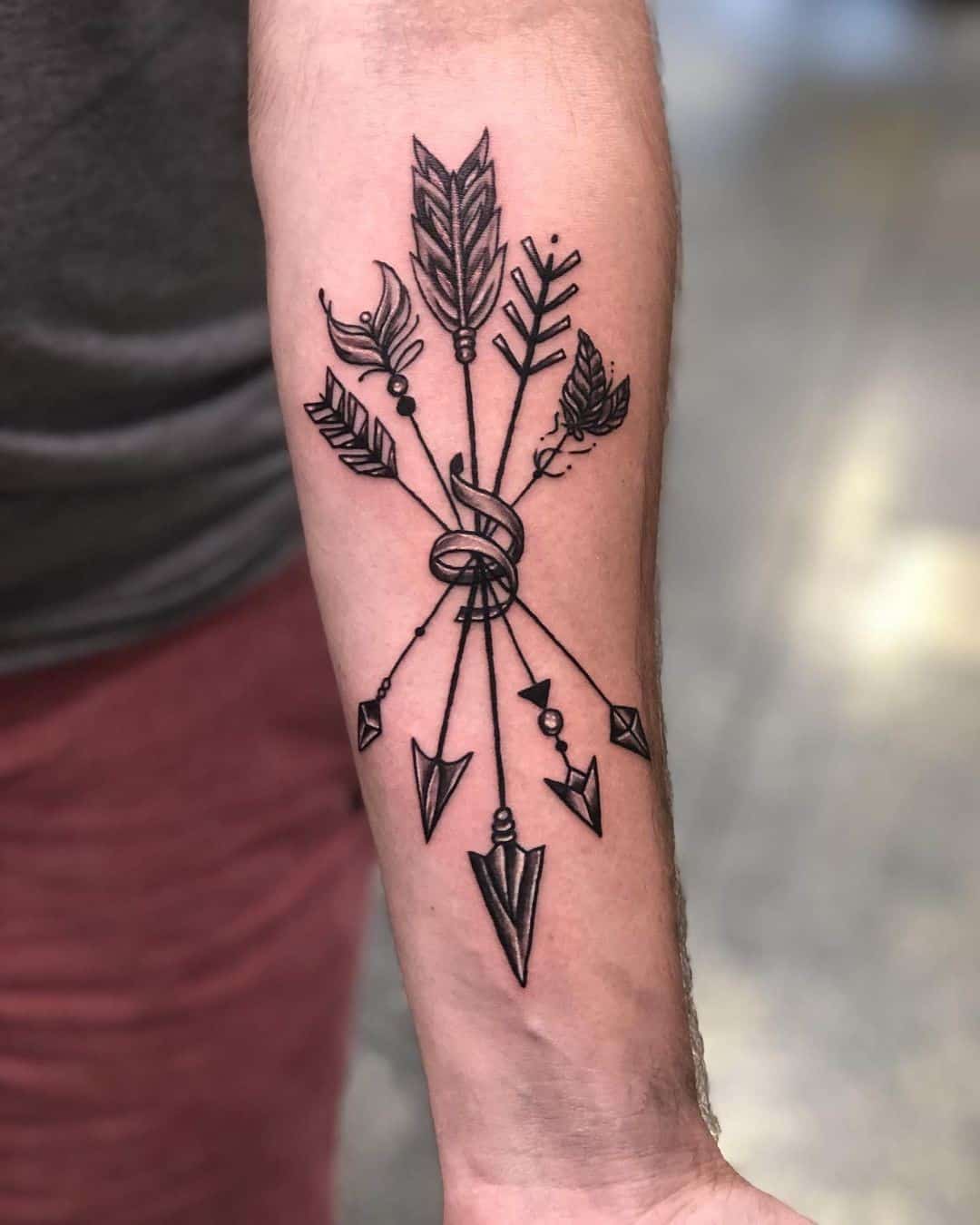 Bunch Of Arrows Tattoos