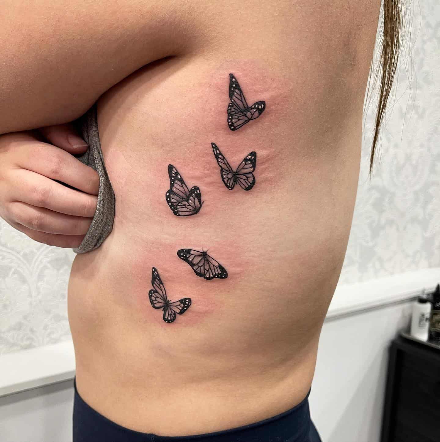 Butterfly side tattoo 1