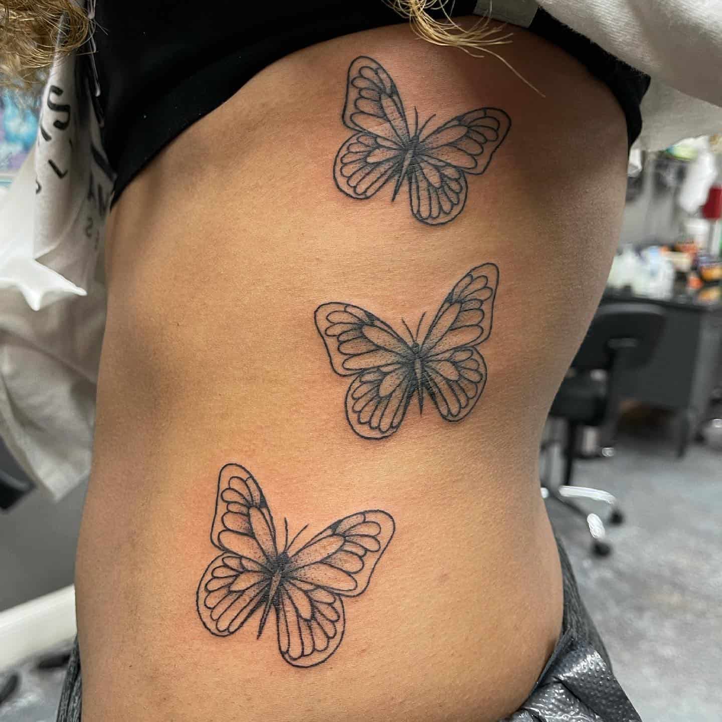 Butterfly side tattoo 3
