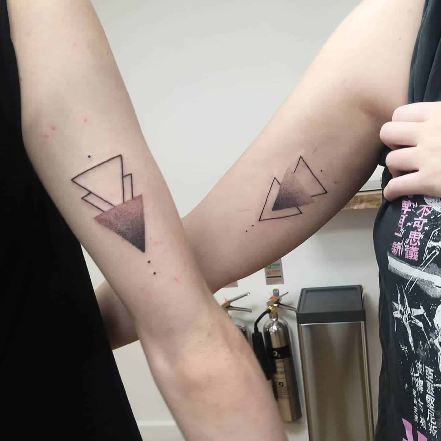 Geometric Brother and Sister Tattoos 2