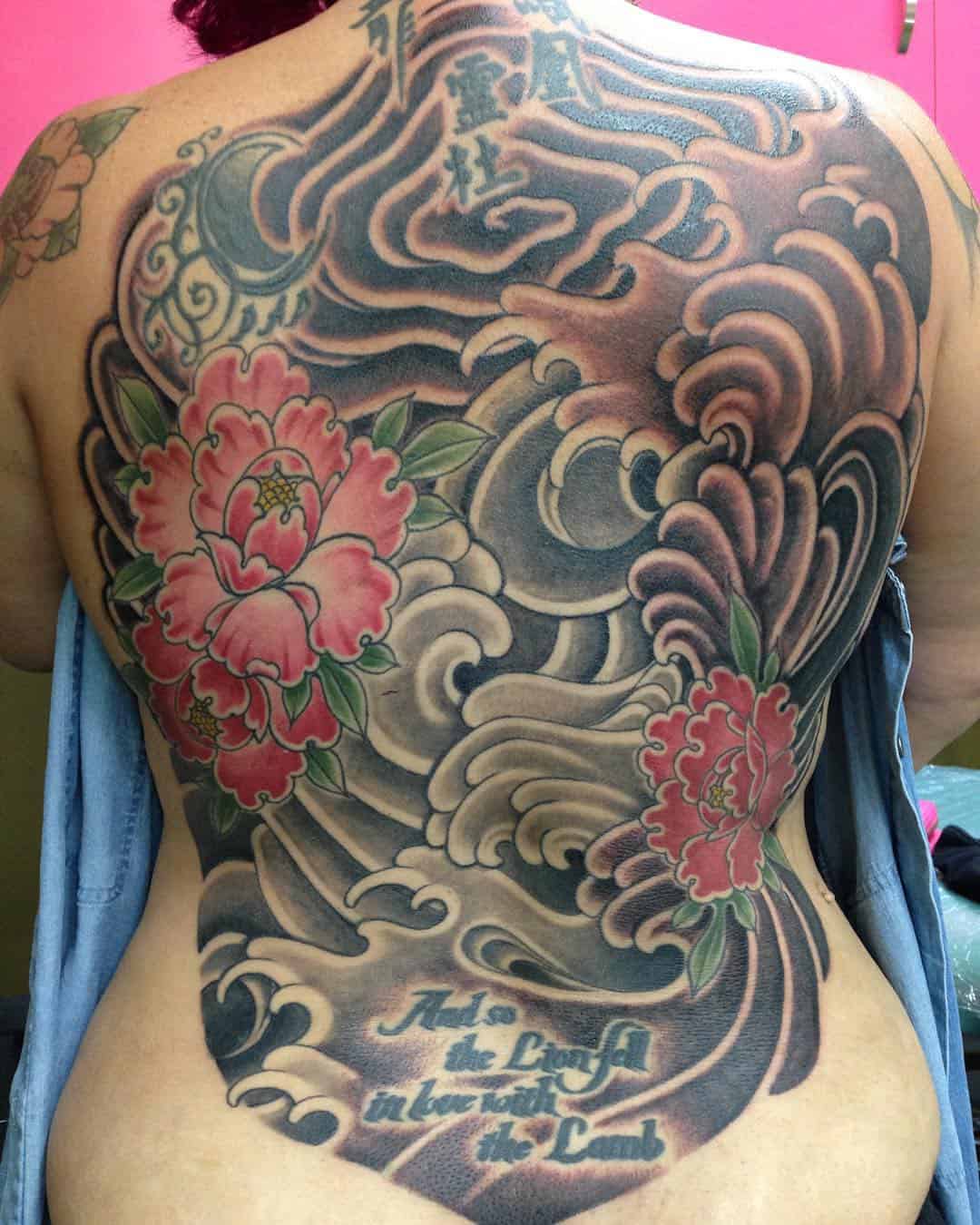 Japanese flower tattoo on back 3