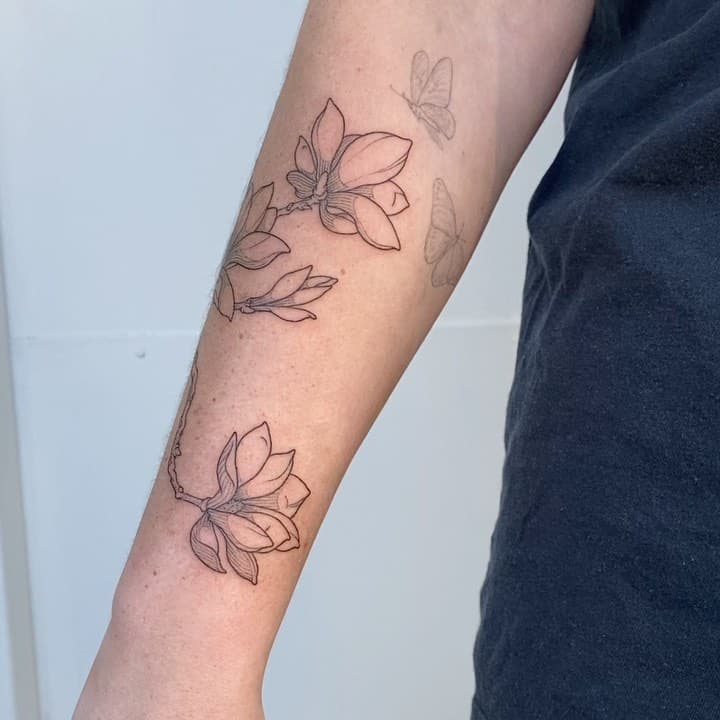 Details 134+ flower tattoo designs forearm best