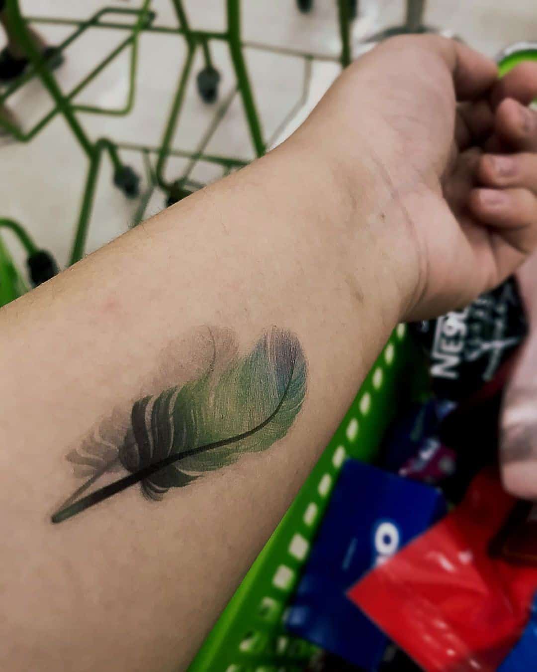 Small Feather Tattoo 3