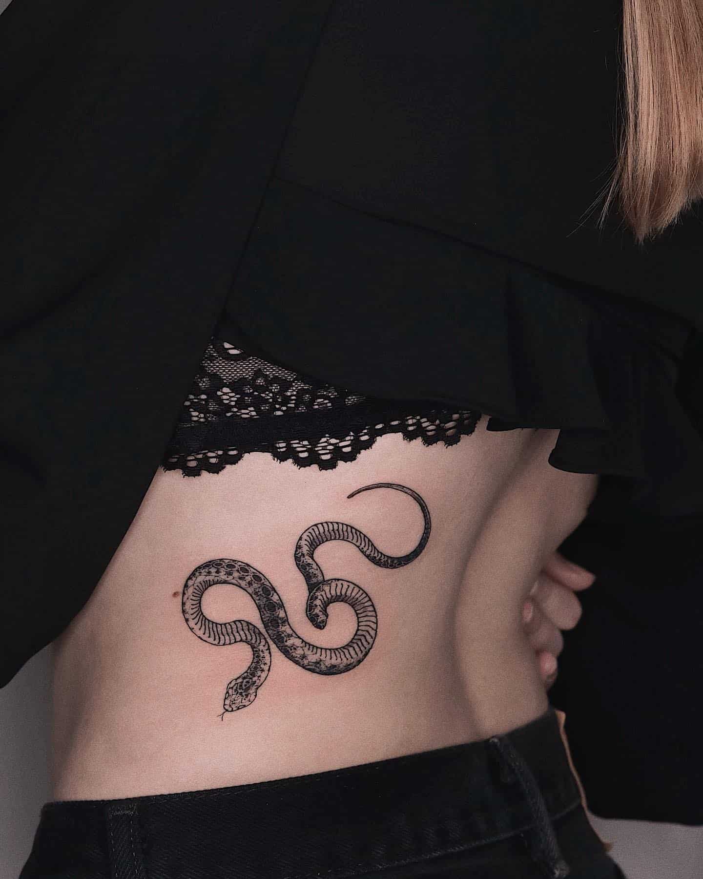 Snake side tattoo 1