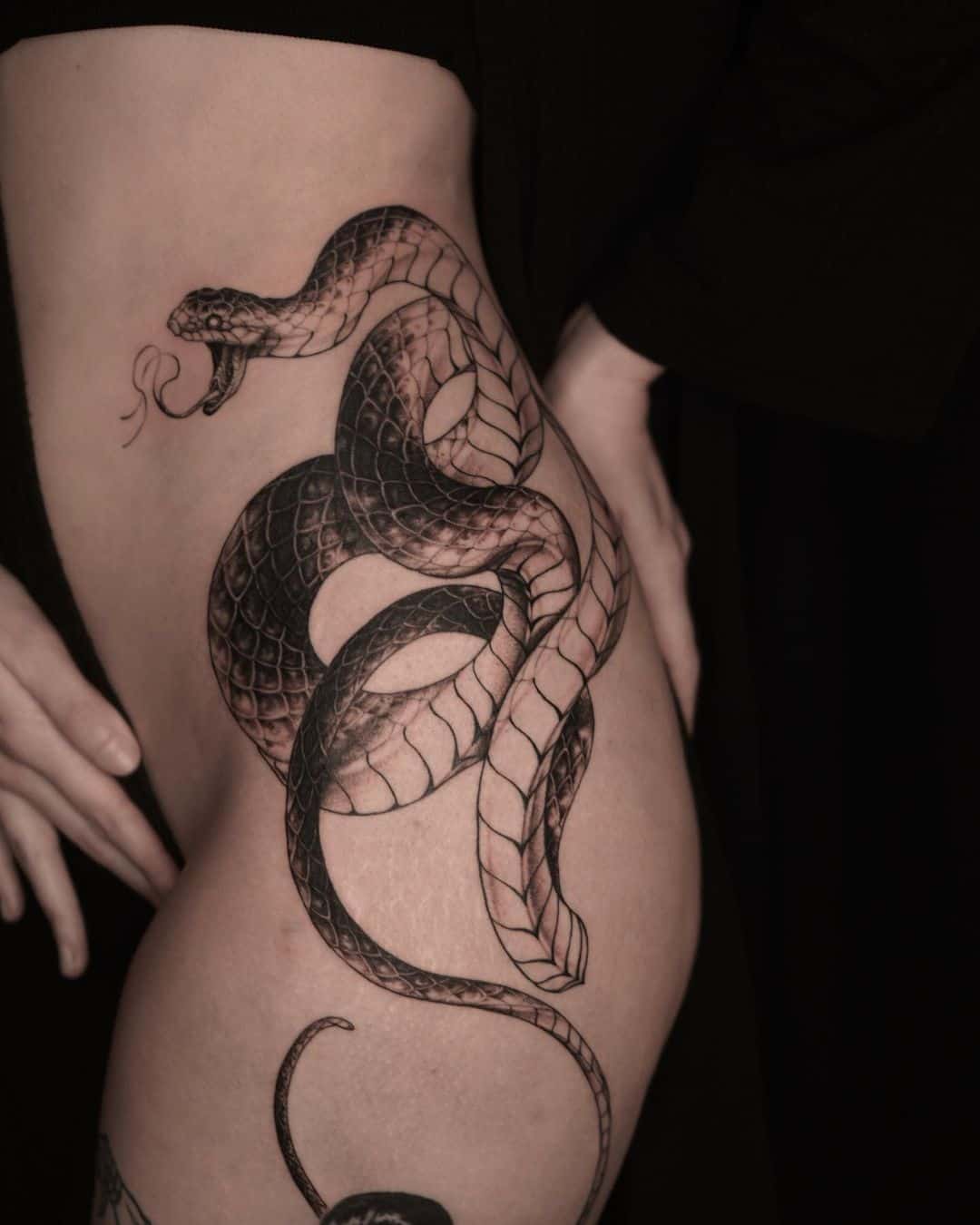 Snake side tattoo 5