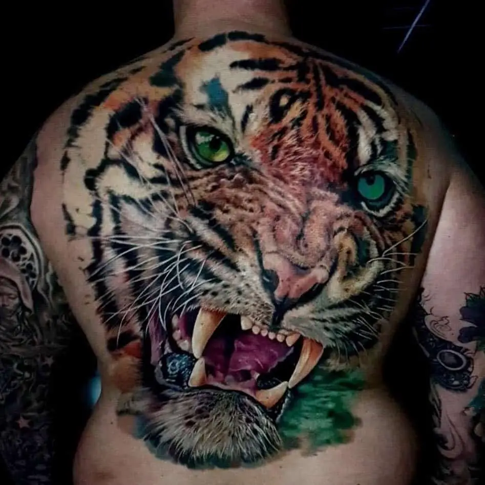 Tiger Eyes Tattoo Over Back