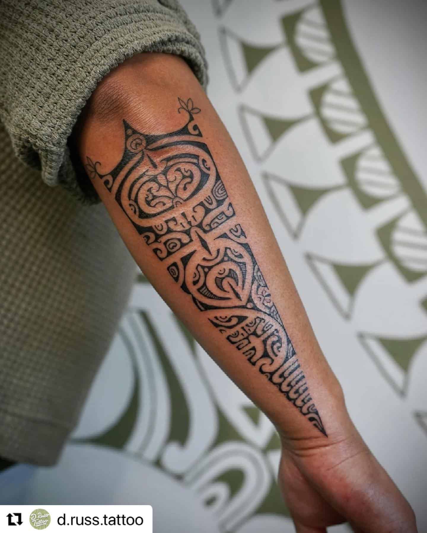 Black Ink Tribal Arm Tattoo Design