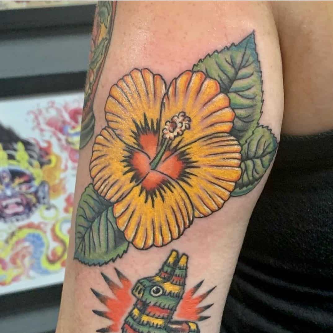 Yellow Hibiscus Flower Tattoo Over Arm
