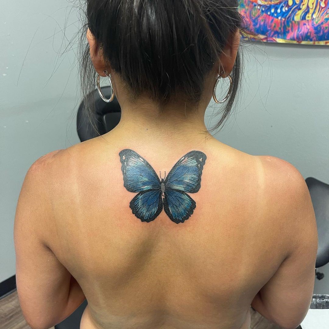 Butterfly Inspired Spine Tattoo 