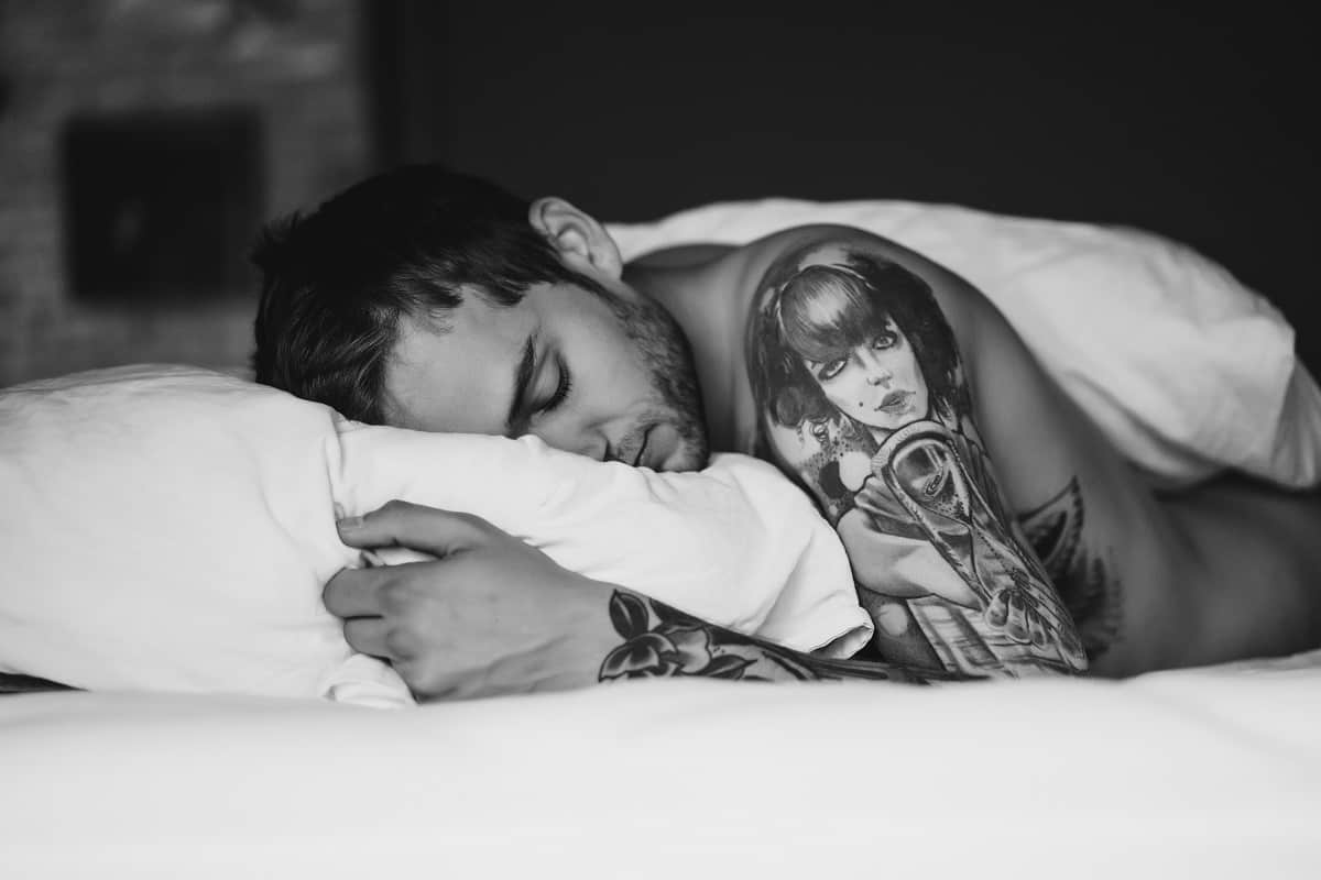 How To Sleep With A New Tattoo: 8 Tips From Expert - Saved Tattoo