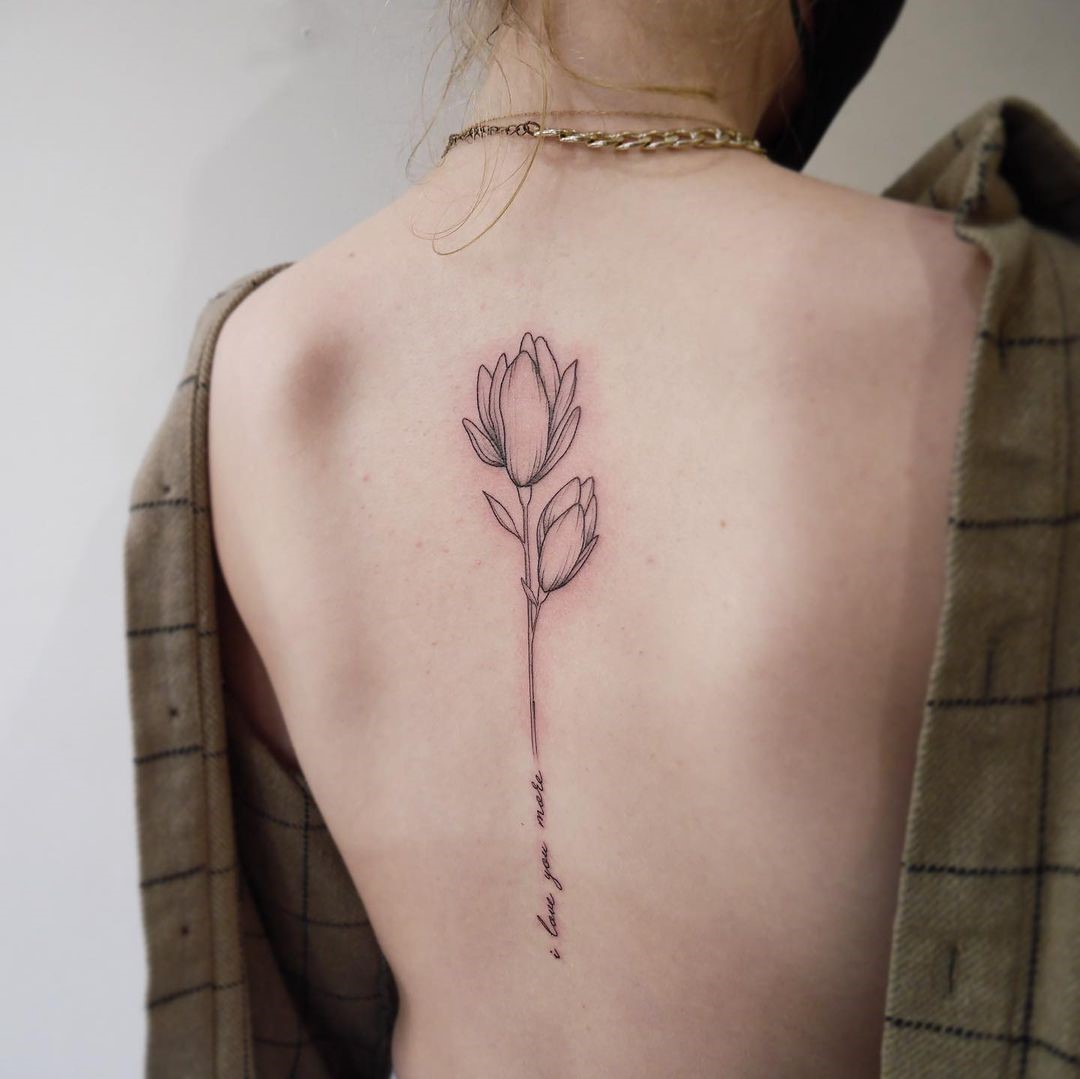 Lotus Flower Tattoo Spine Idea 