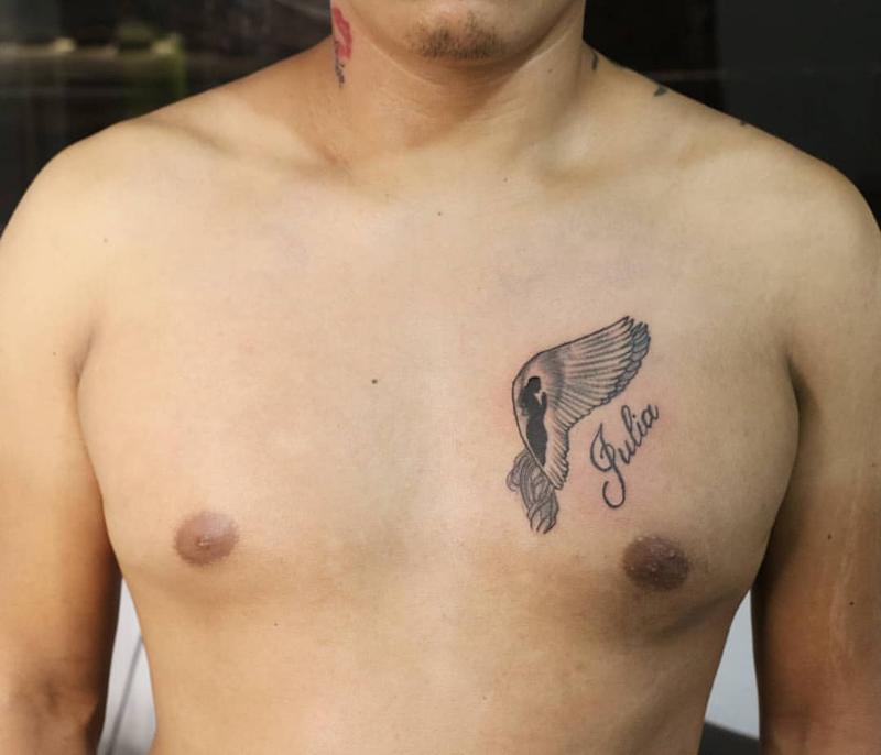 Name chest tattoo 3