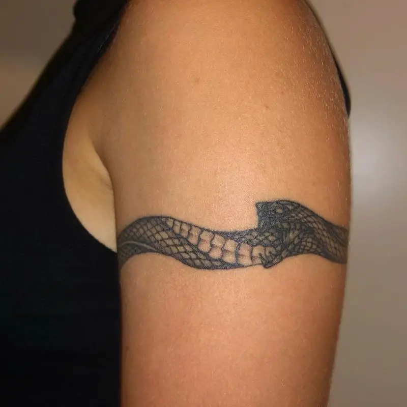 Ouroboros armband tattoo 4