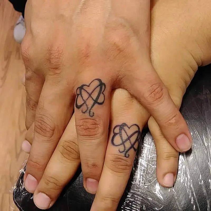 Overlapped Hearts Couple Tattoo