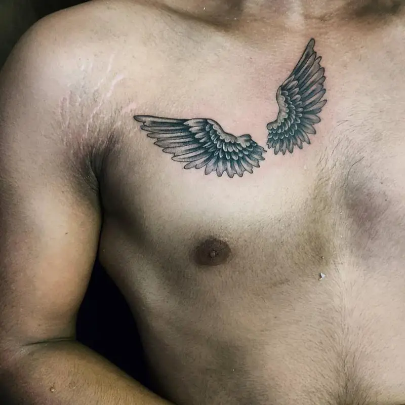 Simple chest tattoo 5
