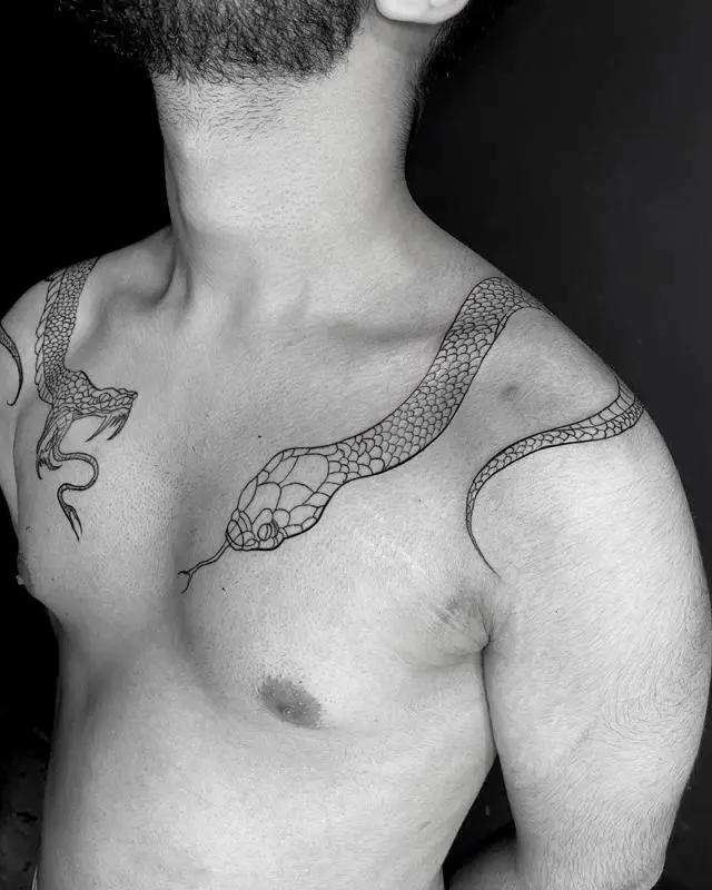 Snake chest tattoo 2