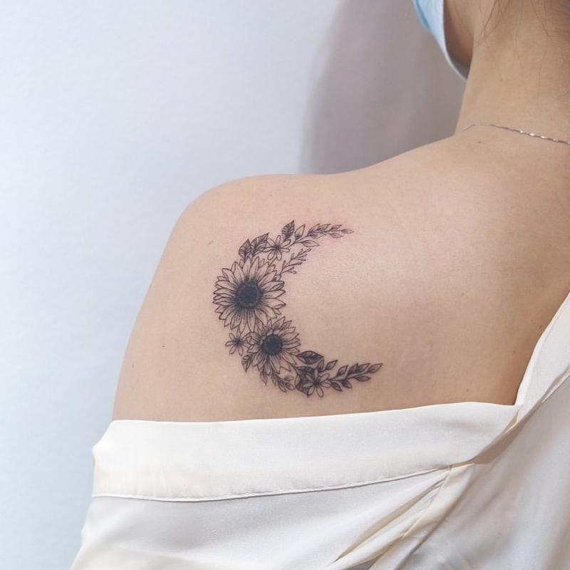 Lotus flower tattoo on the back of a girl. posters for the wall • posters  profession, needle, work | myloview.com