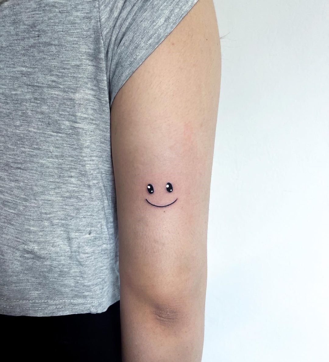 Arm Smile Tattoo Cartoon Idea 