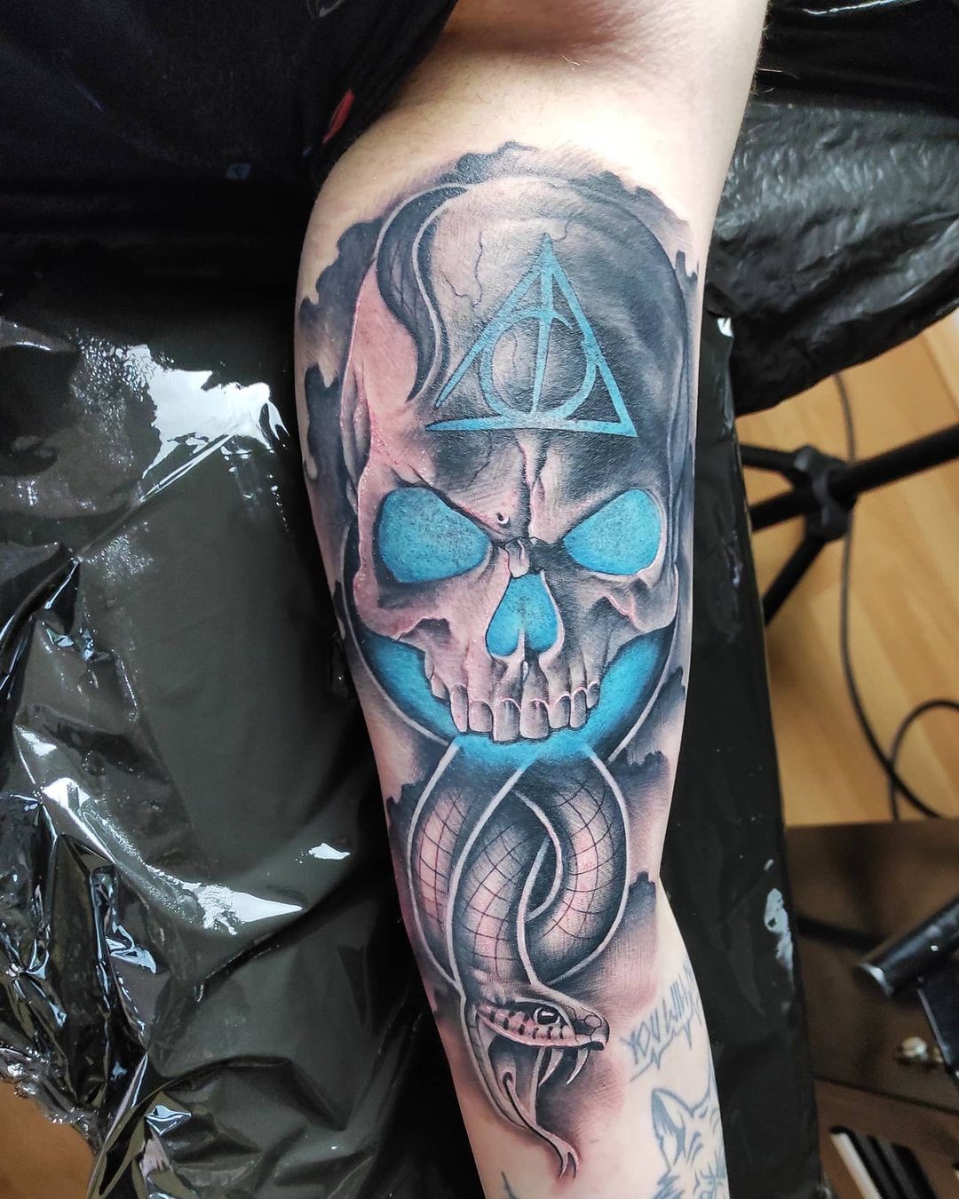 Forearm Black & Blue Death Eater Tattoo