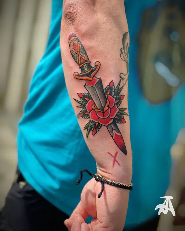 Pierced Dagger And Rose Tattoo 1