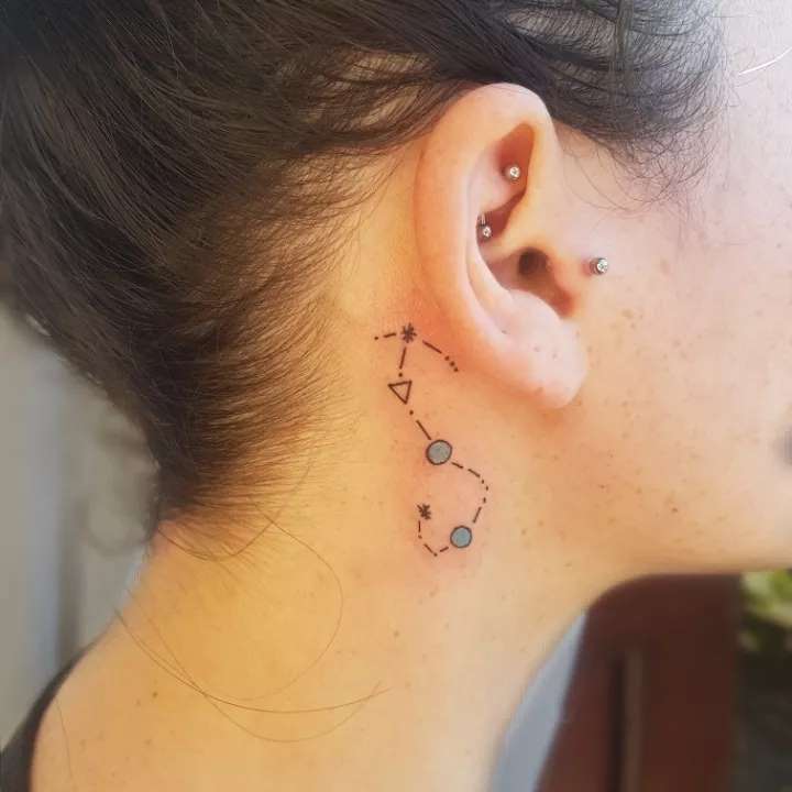 Behind the ear Aries tattoo 1