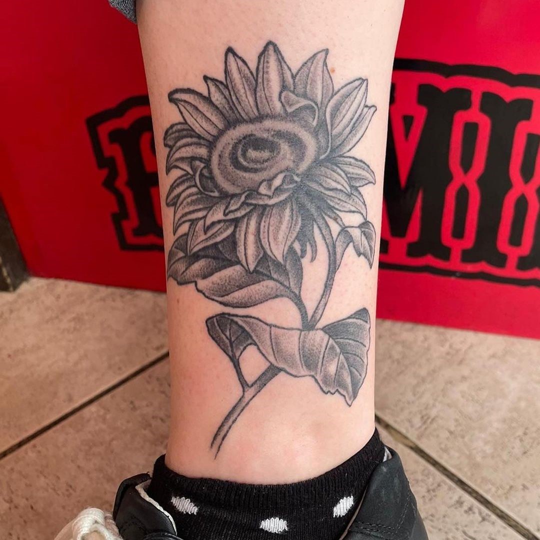 Black Ankle Aster Flower Tattoo 