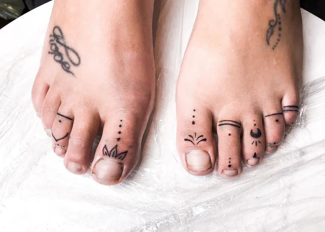 Black Ink Toe Tattoo 