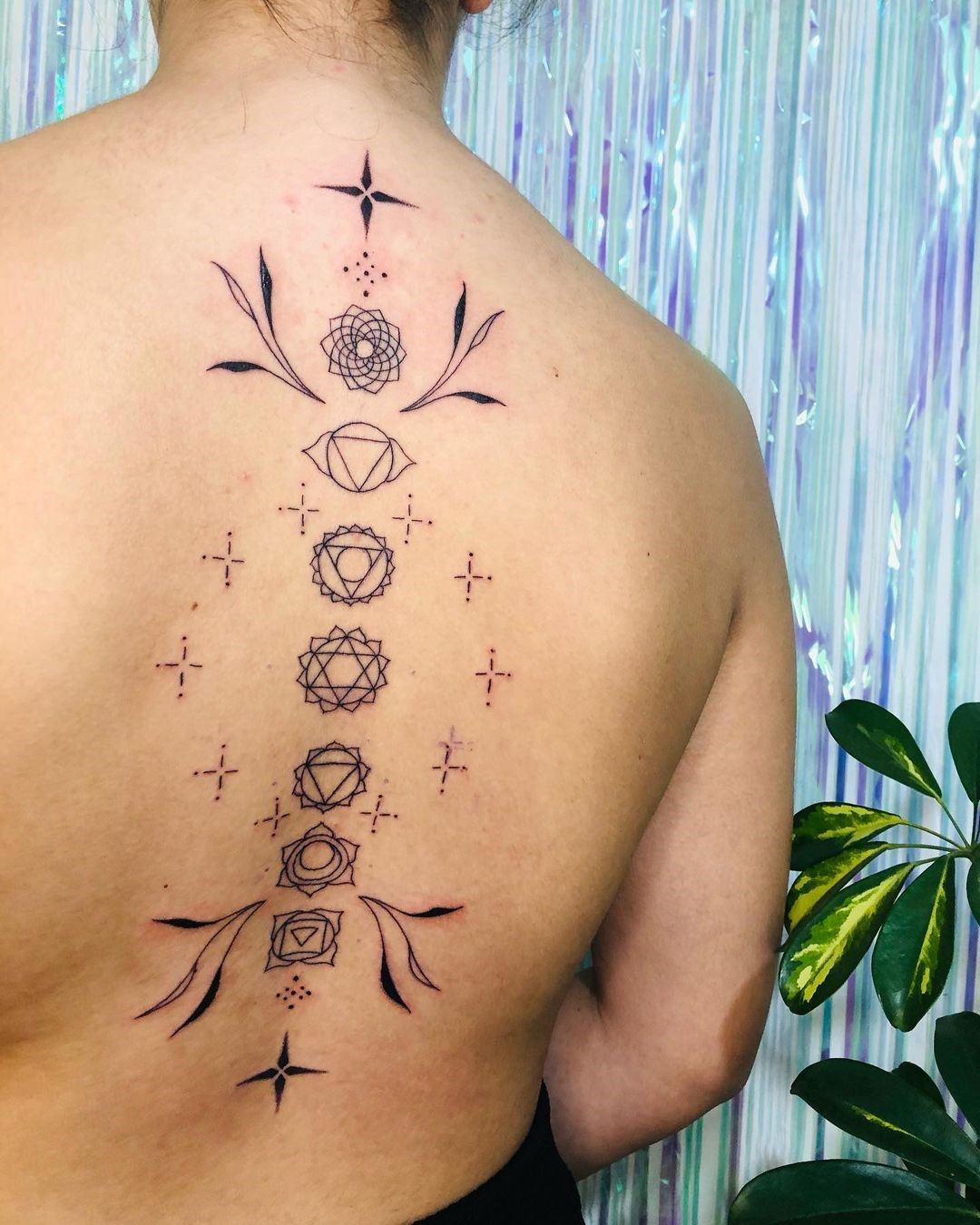 Man with Chakra tattoo on his back.((black color tattoo)) ,high ... -  Arthub.ai
