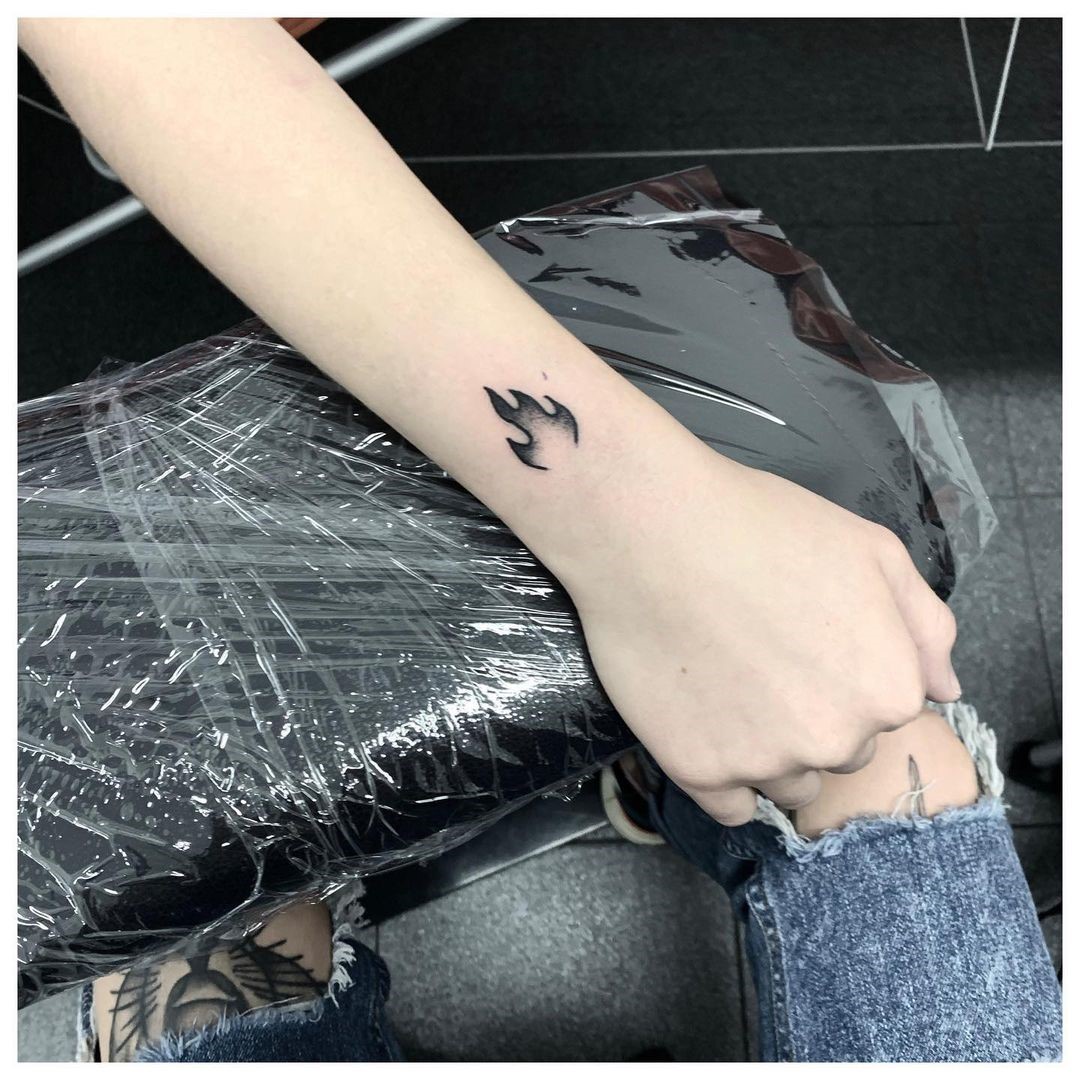 Share 97+ about fire symbol tattoo unmissable - in.daotaonec