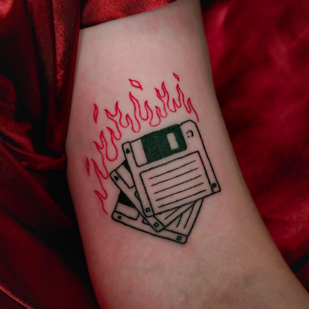 Ring Of Fire Tattoo With CD’s
