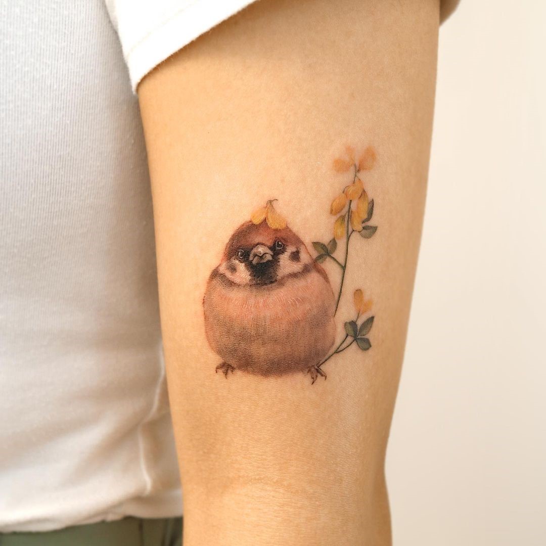 Small & Realistic Sparrow Tattoo Idea 