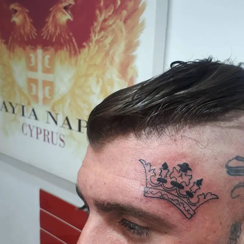 The Crown Face Tattoo