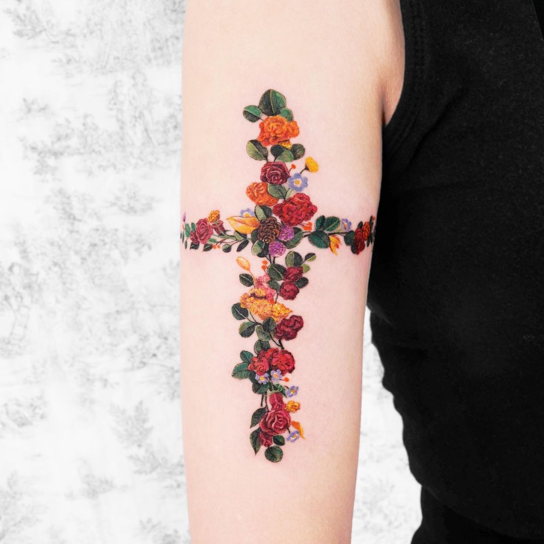 cross flower tattoo arm women