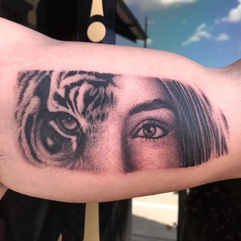 A Human With Tiger Eyes Tattoo Design