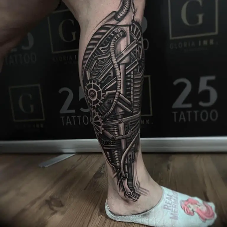 bio mechanical leg tattoo by Ty McEwen TattooNOW