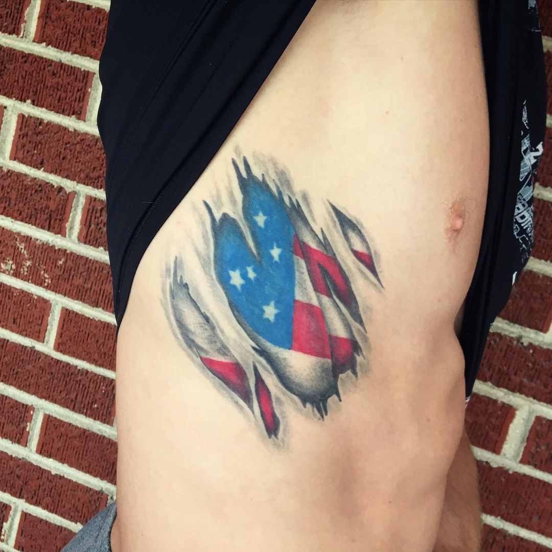 Blue & Red American Flag Tattoo On The Side