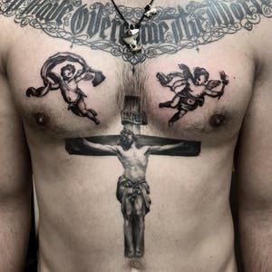 Cherub Angels Tattoo With A Cross