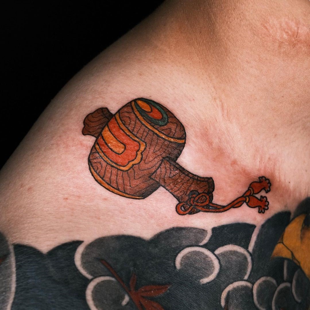 Chest Hammers Tattoo Brown Ink 