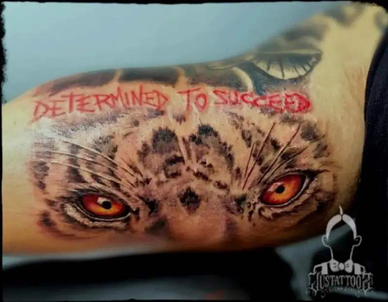 Determined Tiger Eyes Tattoo Design