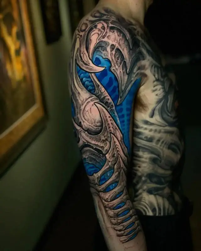 40 Most Creative And Beautiful Biomechanical Tattoo Meanings & Designs - Saved Tattoo
