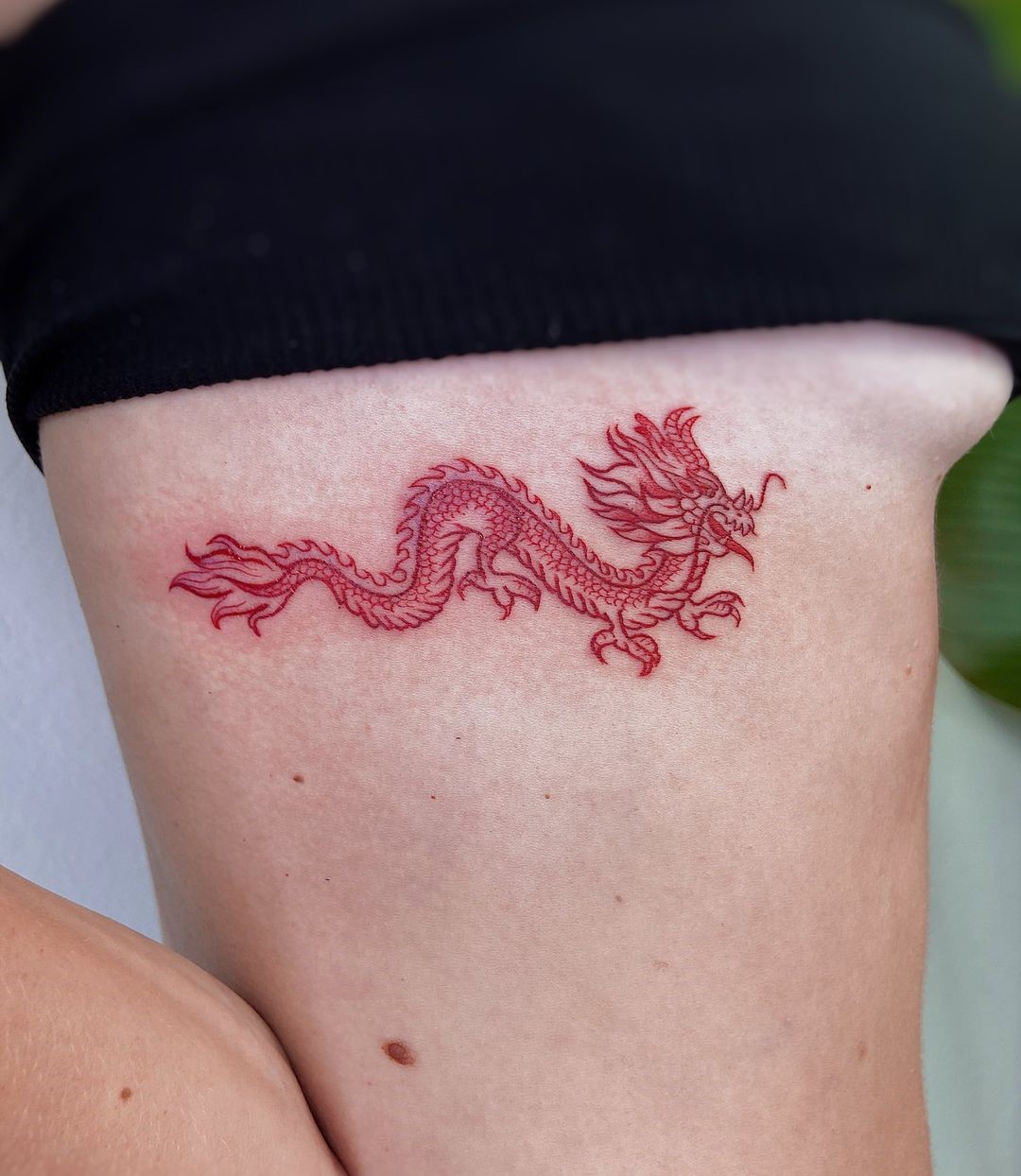 Horizontal Red Dragon Tattoo Design