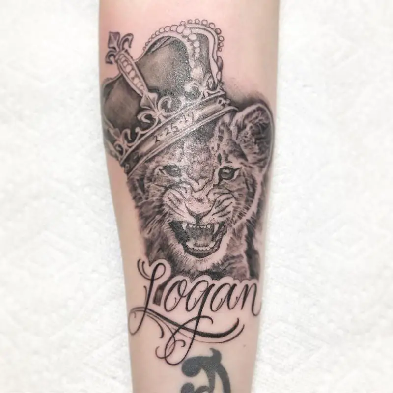 Lion Cub With Crown Tattoo 1