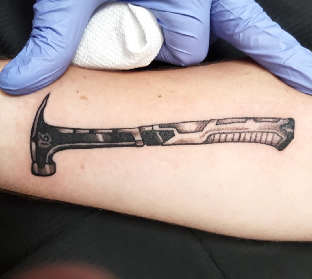 Small & Realistic Hammer Tattoo