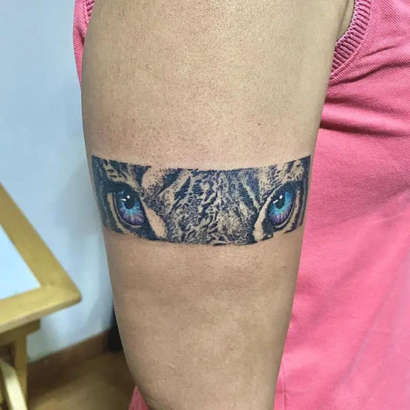 Tiger Eyes Band Tattoo Design