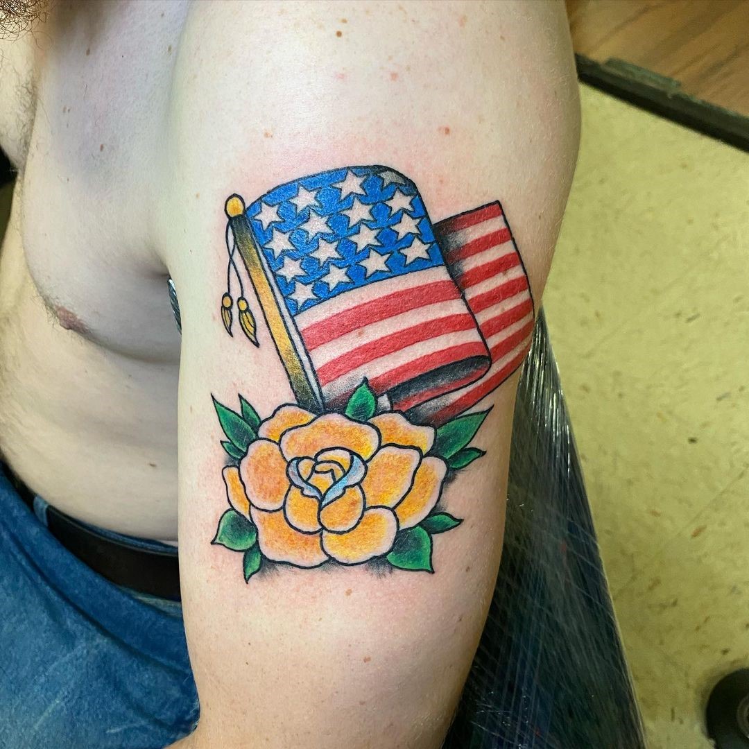US Flag With A Flower Tattoo 