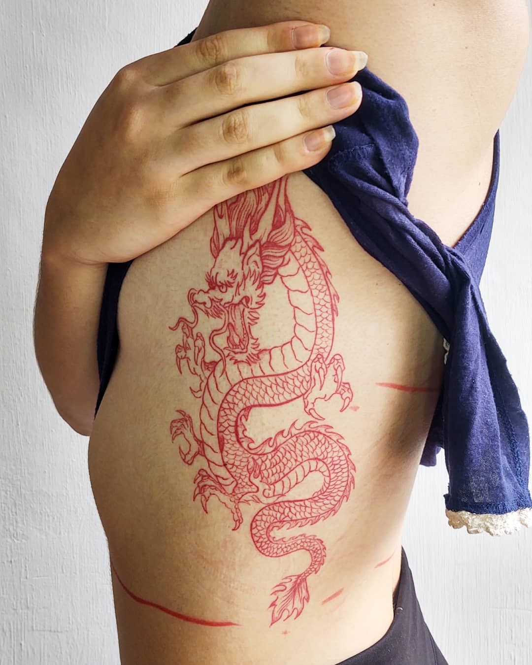 Vertical Red Dragon Tattoo Design 