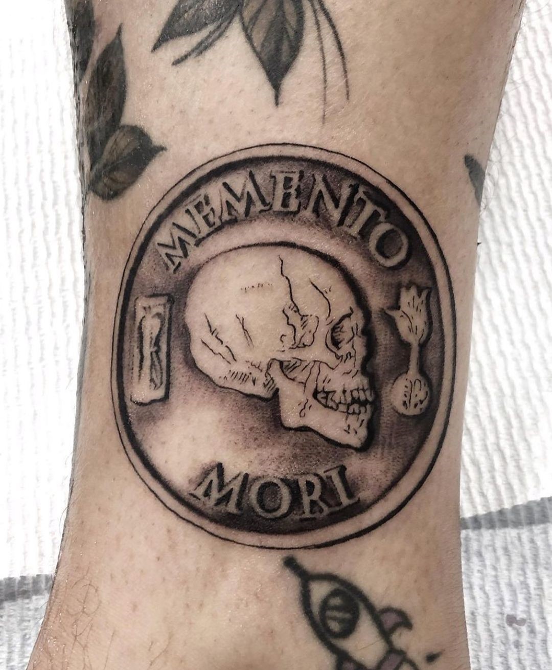 Black Artsy Memento Mori Tattoo With A Skull